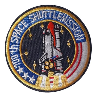 Strygemærke-cirkelform-rumraket-"100 th space shuttlemission" 