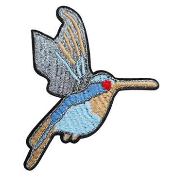 strygemærke-fugl-blå-sand