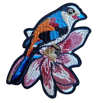 strygemærke-fugl-blomst